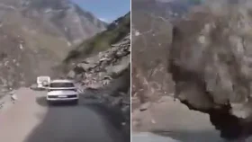 পাহাড় ধসে গাড়ির ওপর পড়লো বিশাল পাথর