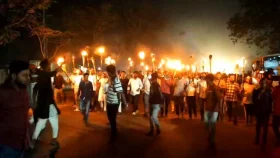 বিএনপি প্রার্থীর মনোনয়ন বাতিলের দাবিতে মশাল মিছিল