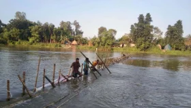 সিংড়ায় আত্রাই নদীতে অবৈধ স্রোতিজাল উচ্ছেদ